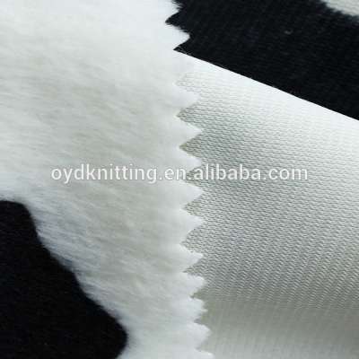 Polyester Cow Pattern Paper Printed One Side Brushed Velboa Fabric for Animal Pajamas/Cushion/Mattress